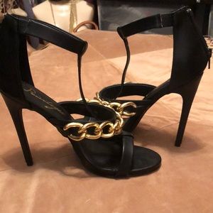Never before worn braided metal accented stilettos
